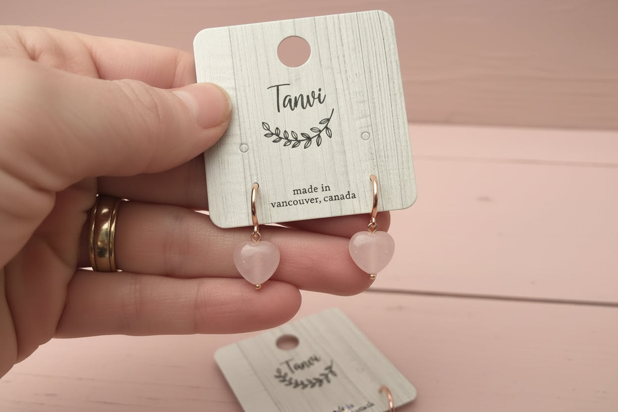 please chanmge the "Graceie Rose" on the cards to read "Tanvi" and change the christmad bacgound to a sofer motred pink on wood

